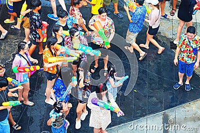 Thai people and foreign travelers enjoy in Songkran Festival at Siam Square, Bangkok Editorial Stock Photo