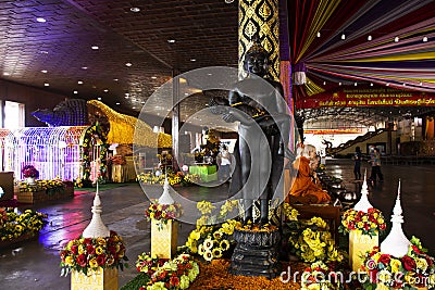 Thai people foreign travelers travel visit and respect praying blessing with holy mystery buddha statue worship of Wat Laksi Rat Editorial Stock Photo