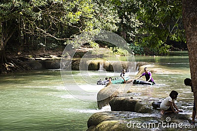 Thai people foreigner travel relax and play swimming in Namtok Chet Sao Noi small waterfall in Saraburi, Thailand Editorial Stock Photo