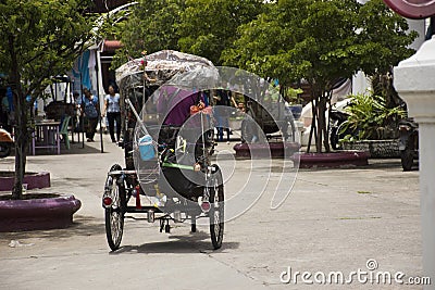 Thai people reding vintage retro tricycle bike or rickshaw of thai style Editorial Stock Photo