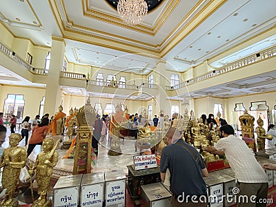 Thai people respect praying and visit for blessing from Luang Phor Sothorn Buddha statue in Chachoengsao, Thailand Editorial Stock Photo