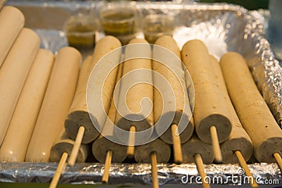 Thai sausage with bamboo stick, in a basket. Stock Photo