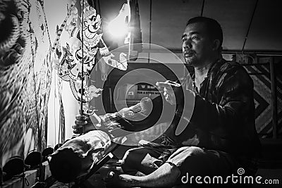 Thai shadow puppet performance artist playing Nang Thalung Thai traditional shadow puppet show Editorial Stock Photo