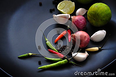 Thai Spice Ingredients on Black Plate Stock Photo