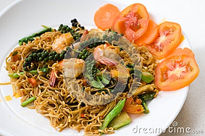 Thai spicy seafood noodle Stock Photo