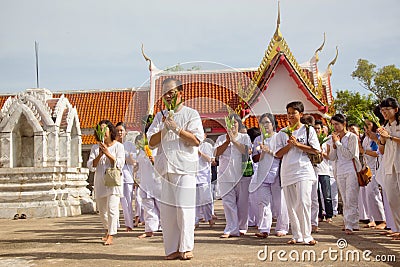 Thai students wear white clothes making a merit at the temple in Pranburi, Thailand July 21,2017 Editorial Stock Photo