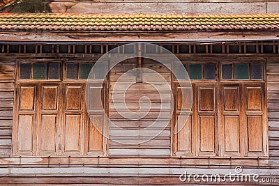 Thai style antique windows in Wat Rat Bamrung Wat Ngon Kai - Samut Sakhon, Thailand Stock Photo