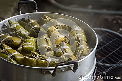 Thai style banana leaves wrapped food Stock Photo