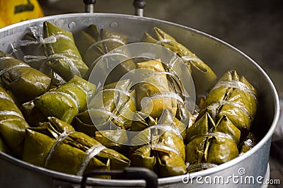 Thai style banana leaves wrapped food Stock Photo