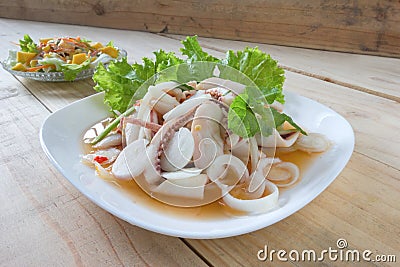 Thai style salad seafood on the wood table Stock Photo