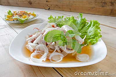 Thai style salad seafood on the wood table Stock Photo