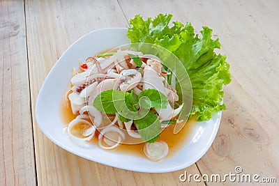 Thai style salad seafood on the wood table Stock Photo