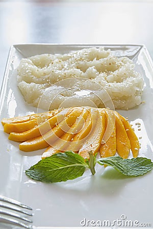 Thai Sweet Mango with Sticky Rice Vertical Stock Photo