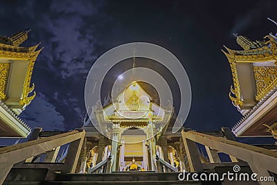 Thai temple at night time, Wat Rat Bamrung or Wat Ngon Kai - Samut Sakhon, Thailand Stock Photo