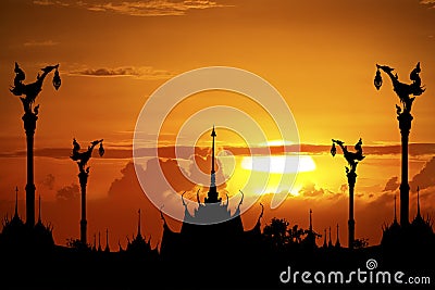 Thai temple in silhouette Stock Photo