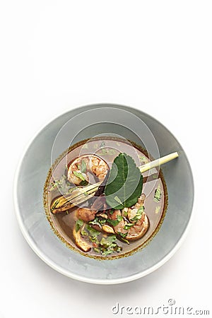 Thai tom yam kung spicy soup with prawns on white background Stock Photo