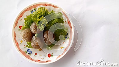 Thai Traditional Desert,Tapica Ball Made From Glutionous Rice filled with Minced Pork and sweet pickled Daikon Redish. Stock Photo