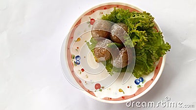 Thai Traditional Desert,Tapica Ball Made From Glutionous Rice filled with Minced Pork and sweet pickled Daikon Redish. Stock Photo