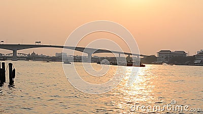 Thai transportation, boat on the Chaophaya river under the beautiful at sunset in Bangkok, THAILAND. 28 Febuary 2017 stock footage Thai transportation, boat on the Chaophaya river under the beautiful at sunset in Bangkok, THAILAND. 28 Febuary 2017 stock footage
