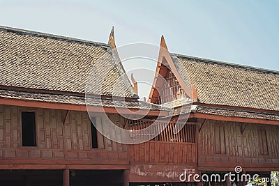 Thai vintage wood house with blue sky view, culture public park Stock Photo