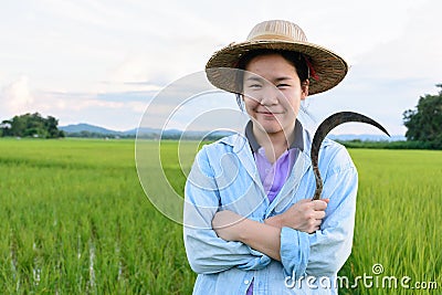 Thai women farmer with sickle in hand Editorial Stock Photo