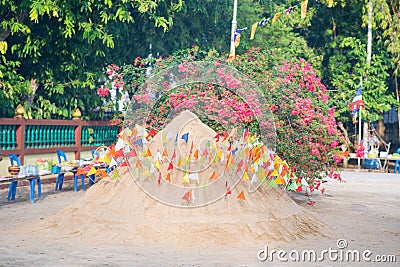 Thailand 13 Apr :: Sand and colorful flag for pray in Songkran F Editorial Stock Photo