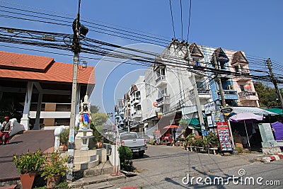 Town, sky, neighbourhood, street, city, road, downtown, residential, area, building, tree, facade, temple, plaza Editorial Stock Photo