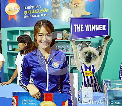 Thailand dog show 2014, unidentified Model promoted for dog foods at Impact Arena Muengthong Thanee Bangkok Thailand on June Editorial Stock Photo