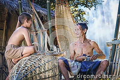 Thailand Father and son are working hand made Basket bamboo or f Stock Photo