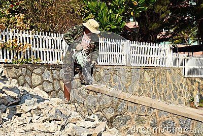Normal construction work in Asia. Worker construction process autdoor Editorial Stock Photo