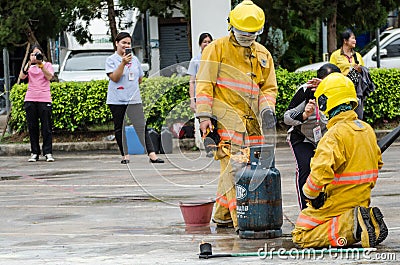Thailand : July 30, 2019 :Peoples preparedness for fire drill and training to use a fire safety tank in the hospital.Udonthani, Editorial Stock Photo