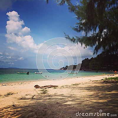 Thailand KoPhangan beach sand sea tree sky clouds Stock Photo