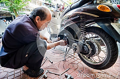 Thailand man mechanic motorcycle Editorial Stock Photo