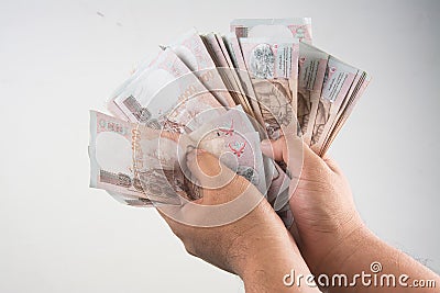 The Thailand money in hand ,isolate Stock Photo