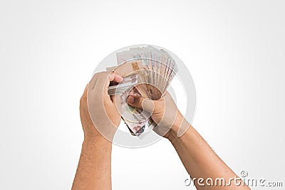 The Thailand money in hand ,isolate Stock Photo