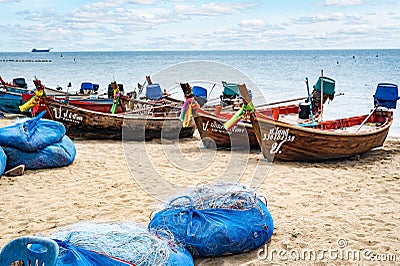 Thailand national fishing seaport and colored boats with nets and gear for fishing Editorial Stock Photo