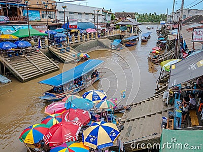 THAILAND, SAMUTSONGKHRAM - JUNE 17: Traditional thai steet food at Amphawa floating market in Thailand.Amphawa floating market. Editorial Stock Photo