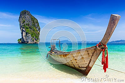 Thailand summer travel sea, Thai old wood boat at sea beach Krabi Phi Phi Island Phuket. Stock Photo