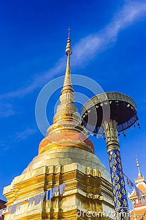 Golden pagoda at Wat Pong Sanuk temple Lampang. Stock Photo