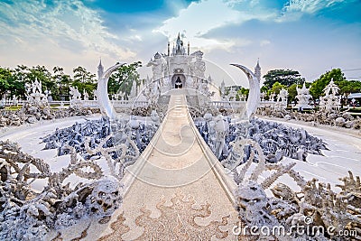 Thailand temple or grand white church Call Wat Rong Khun,at Chiang Rai province, Thailand,Contemporary unconventional Buddhist te Stock Photo