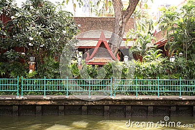 Thailand temple, river, footpath and tree at daytime Stock Photo