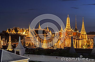 Thailand temple travel Grand palace Emerald Buddha Wat Phra Kaew at twilight Blue Sky from traffic in Bangkok, Thailand Stock Photo