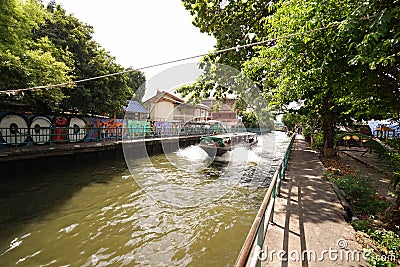 Thailand tourist canal boat on village river at daytime Editorial Stock Photo