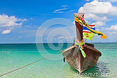 Thailand traditional longtail boat on tropical beach Stock Photo