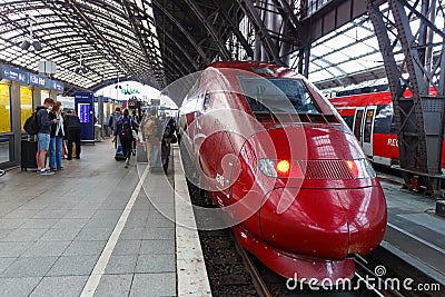 Thalys high-speed train at Cologne KÃ¶ln main railway station Hauptbahnhof Hbf in Germany Editorial Stock Photo