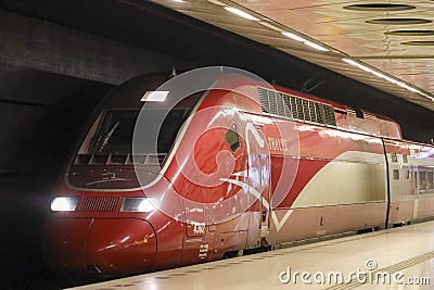 Thalys international train from Amsterdam to Paris along platform at station Schiphol Airport in Amsterdam Editorial Stock Photo