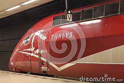 Thalys international train from Amsterdam to Paris along platform at station Schiphol Airport in Amsterdam Editorial Stock Photo