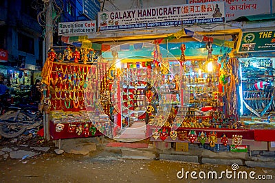 THAMEL, KATHMANDU NEPAL - OCTOBER 02, 2017: Night view of a store of handicraft in the streets of Thamel. Thamel is a Editorial Stock Photo