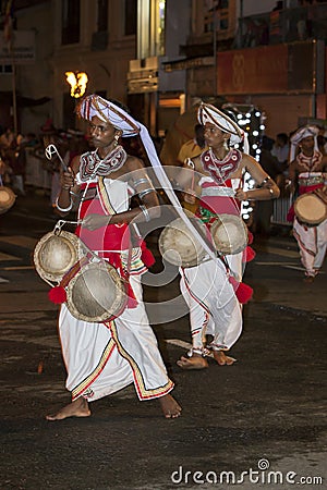 Thammattam Players perform during the Esala Perahera. Editorial Stock Photo