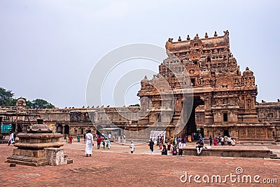 Thanjavur, Tamil Nadu, India - Oct 19 2023: Worshippers and tourists walking along the complex of Thanjavur Big Temple( Editorial Stock Photo